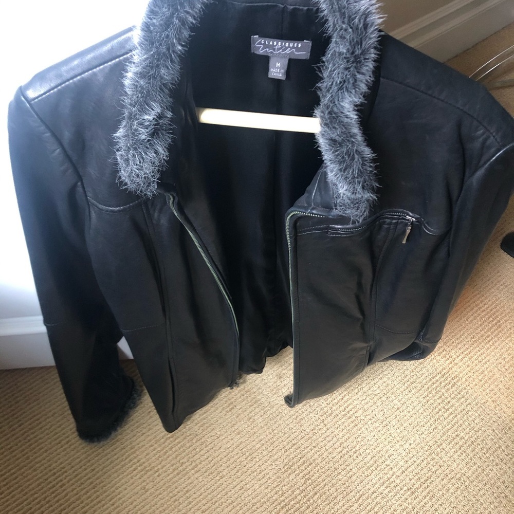 Leather fur trimmed jacket